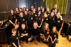 Musician Sting with members of North Tyneside Youth Choir.