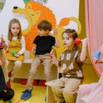 Early Years children exploring music making through chime bells